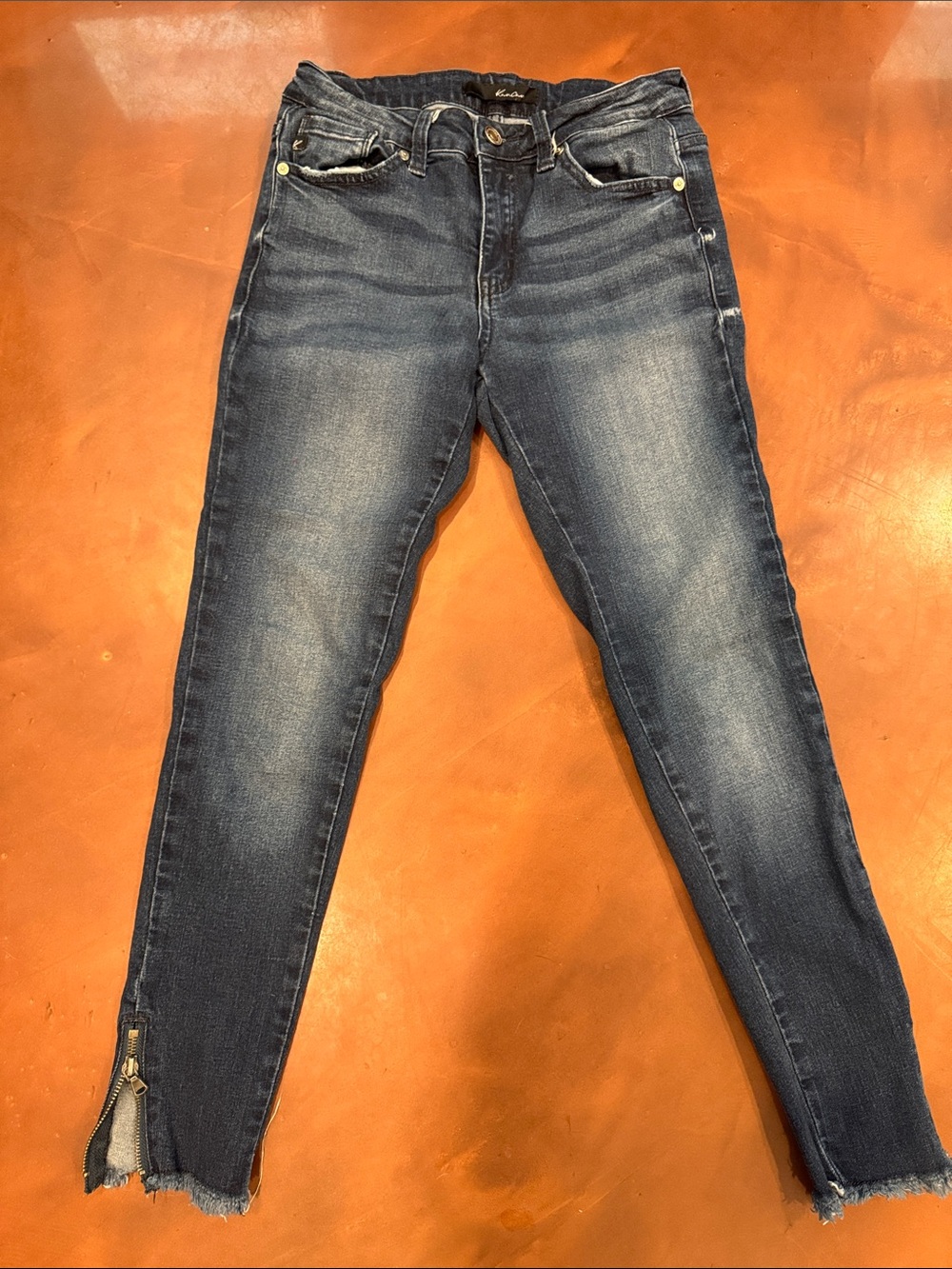Dark Wash Women’s Jeans - Classic Slim Fit with zippers at ankles.